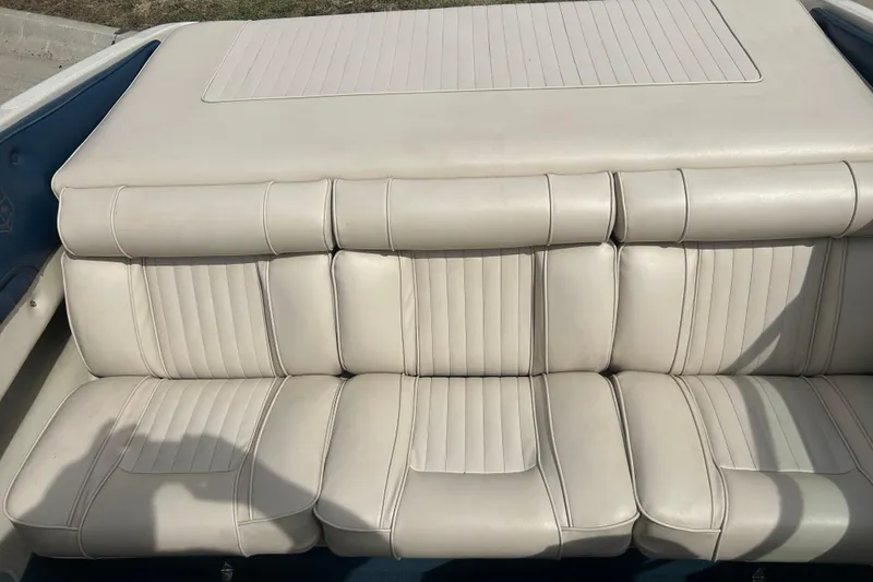 Slide: The Image of Cream leather seats in a 1996 Mariah 180 Shabah boat interior. - 23