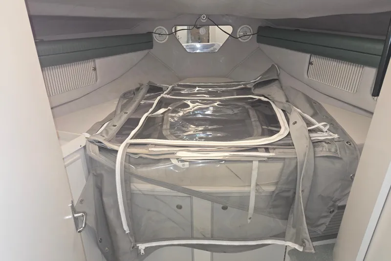 Slide: The Image of Interior cabin of 1994 Cruisers Yachts 3380 Esprit with storage and bedding. - 10