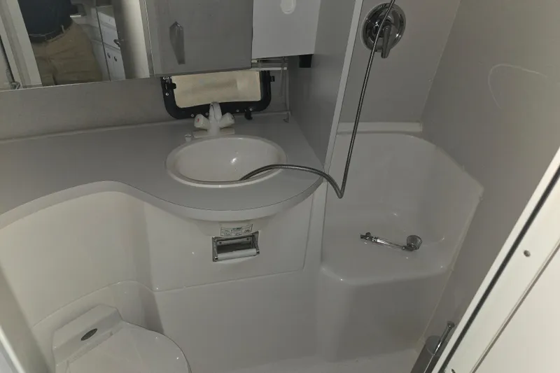 Slide: The Image of Bathroom interior of 1994 Cruisers Yachts 3380 Esprit with sink and shower. - 14