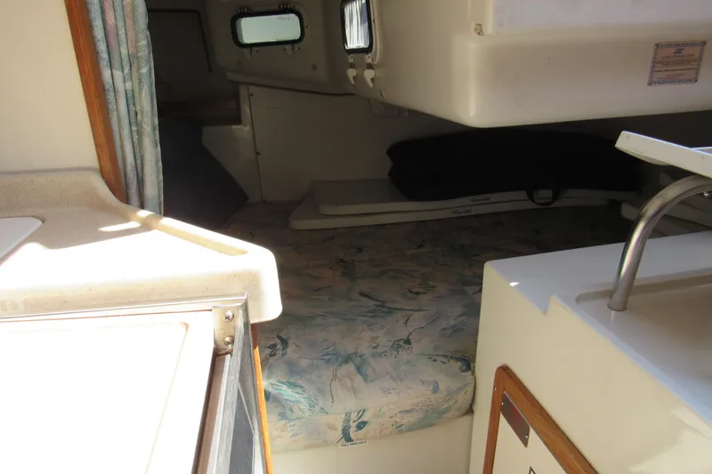 Slide: The Image of Interior cabin of 1997 Catalina 28 MkII sailboat with bed and kitchenette. - 17