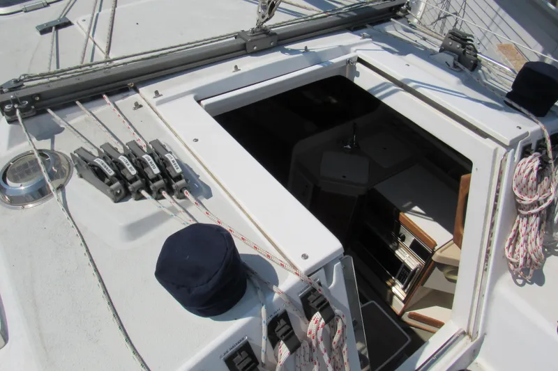 Slide: The Image of Deck view of a 1997 Catalina 28 MkII sailboat, showing rigging and cabin entrance. - 8