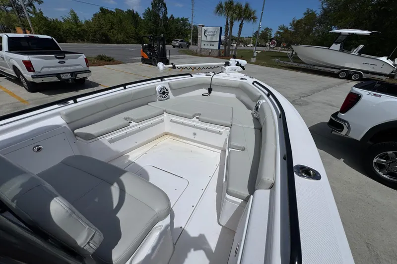 Slide: The Image of 2022 Everglades 243 Center Console boat with spacious seating and modern design. - 15
