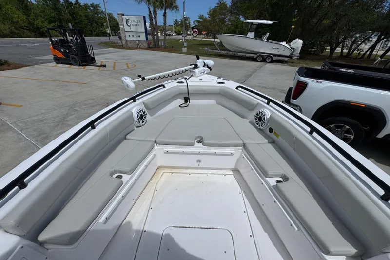 Slide: The Image of 2022 Everglades 243 Center Console boat with spacious seating and modern design. - 16