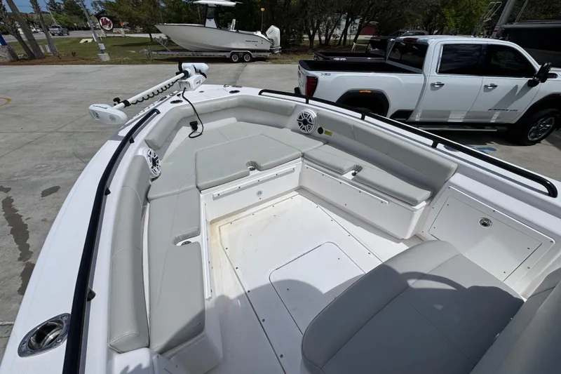 Slide: The Image of 2022 Everglades 243 Center Console boat with spacious seating and modern design. - 17