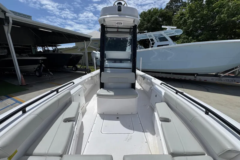 Slide: The Image of 2022 Everglades 243 Center Console boat with spacious seating and modern design. - 20