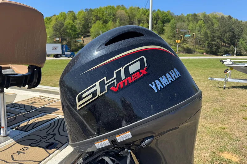 Slide: The Image of Yamaha SHO VMAX engine on 2026 Xpress H20B Bay boat, outdoors. - 8