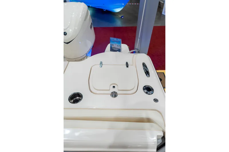Slide: The Image of 2026 Grady-White Canyon 326 boat deck with storage compartments and cup holders. - 12