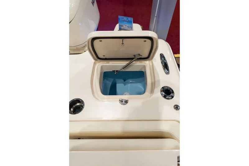 Slide: The Image of Open hatch on 2026 Grady-White Canyon 326 boat, showcasing storage compartment. - 13