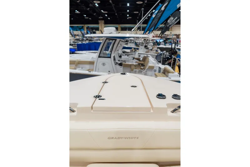 Slide: The Image of 2026 Grady-White Canyon 326 boat showcased at a marine exhibition. - 21