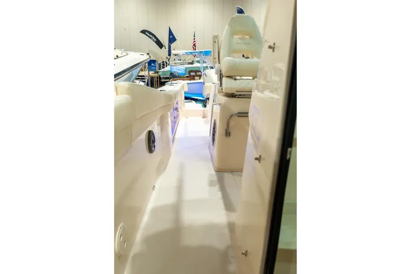 Slide: The Image of 2026 Grady-White Canyon 326 boat interior, showcasing sleek design and comfortable seating. - 24