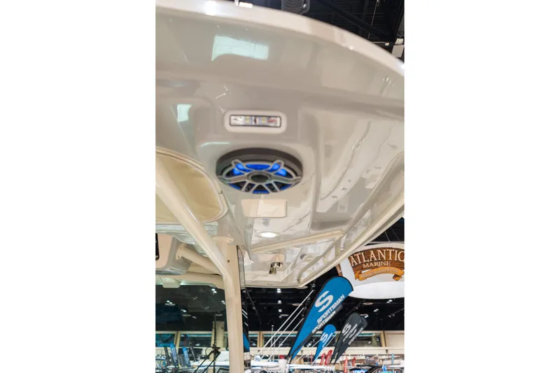 Slide: The Image of 2026 Grady-White Canyon 326 boat interior with speaker and lighting details. - 25