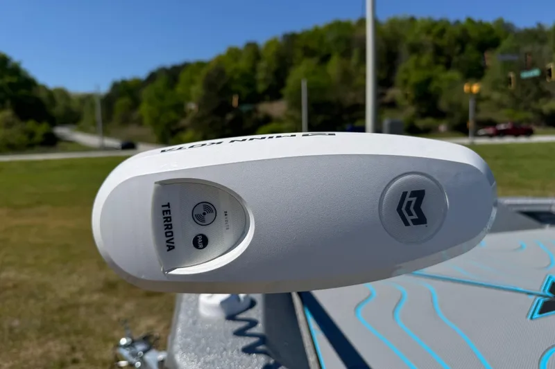 Slide: The Image of Close-up of a Terrova motor on a 2025 Xpress H20B Bay boat. - 3