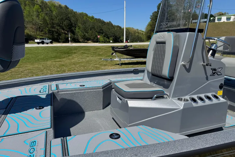 Slide: The Image of 2025 Xpress H20B Bay boat interior with sleek seating and modern design. - 6