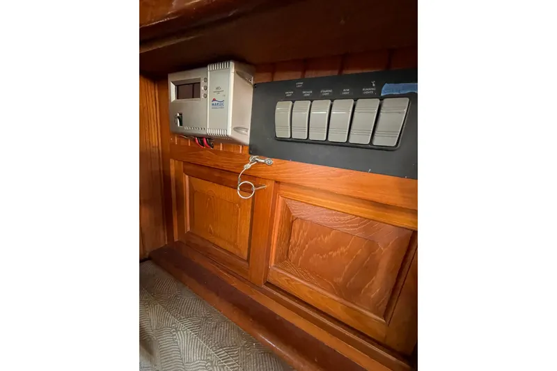 Slide: The Image of Electrical panel and control switches inside a 1981 Hans Christian MKII boat. - 25