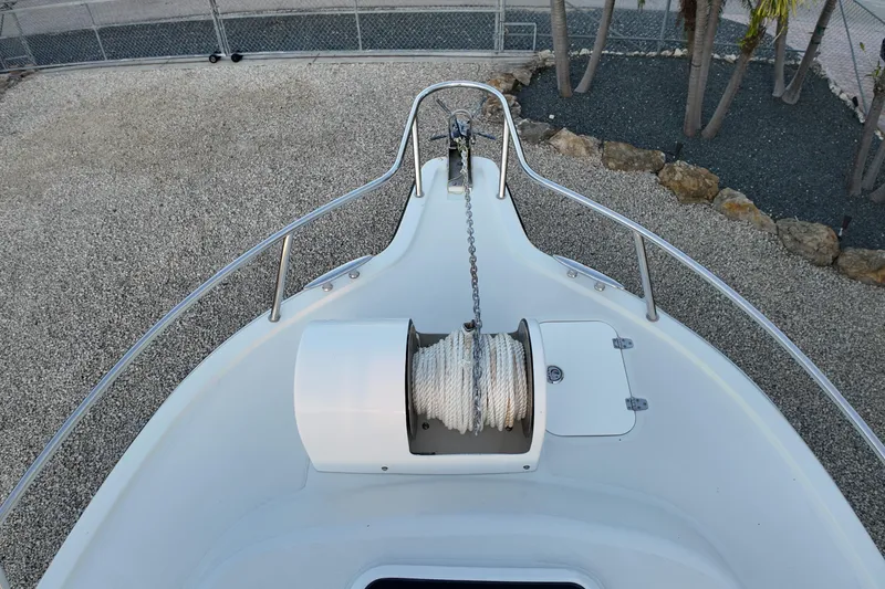 Slide: The Image of Bow view of 2003 Pro Sports 2860 SC ProKat boat with anchor chain and rope. - 11