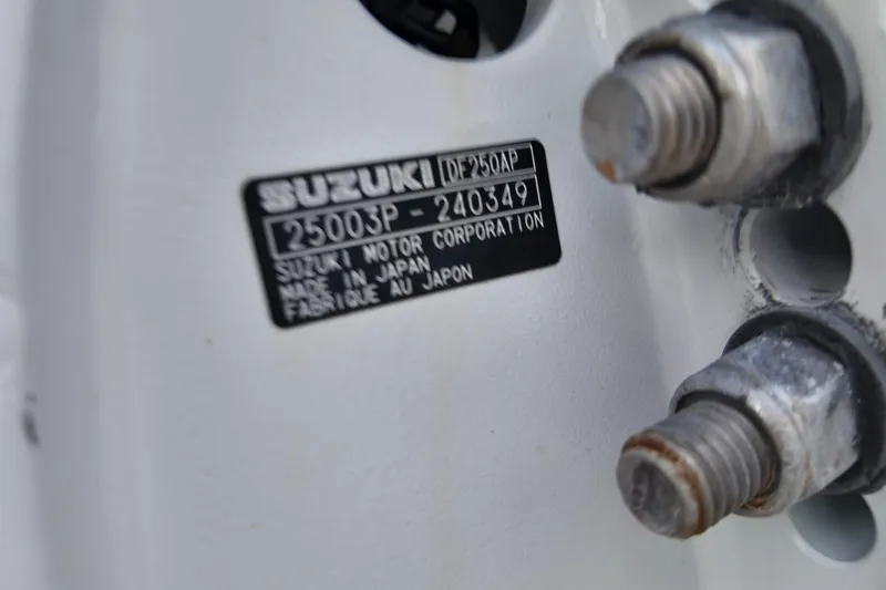 Slide: The Image of Close-up of Suzuki motor label on 2003 Pro Sports 2860 SC ProKat. - 18