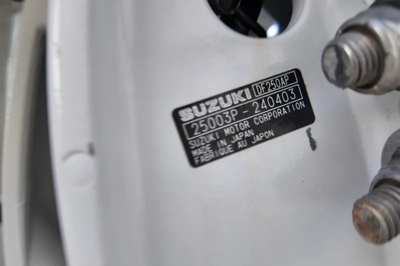 Slide: The Image of Close-up of Suzuki DF250AP engine label on 2003 Pro Sports 2860 SC ProKat. - 19