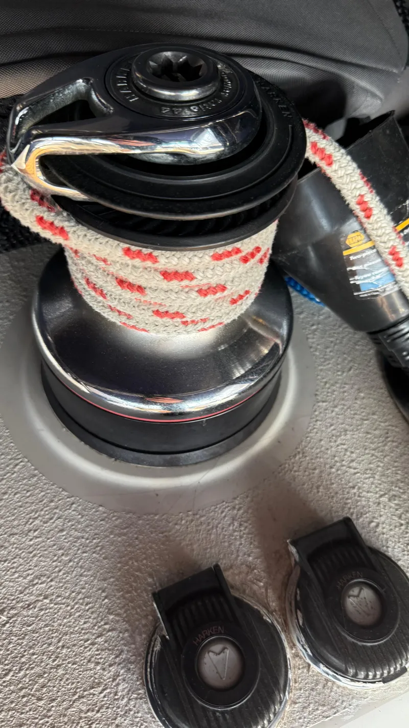 Slide: The Image of Winch with rope on 2004 Catalina 470 sailboat deck. - 38