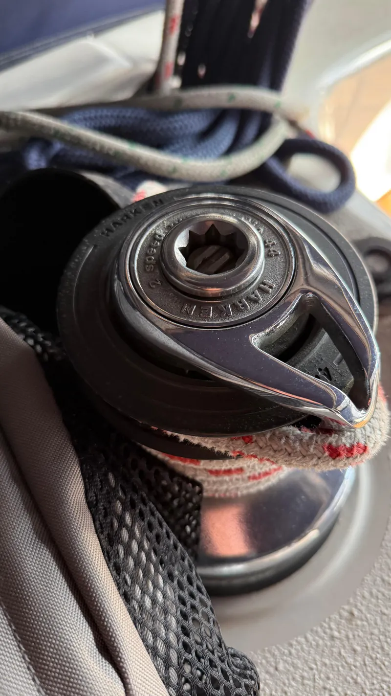 Slide: The Image of Close-up of a winch on a 2004 Catalina 470 sailboat with ropes. - 39