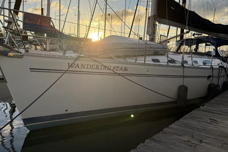 Slide: The Image of Catalina 470 sailboat "Wandering Star" docked at sunset, 2004 model. - 54