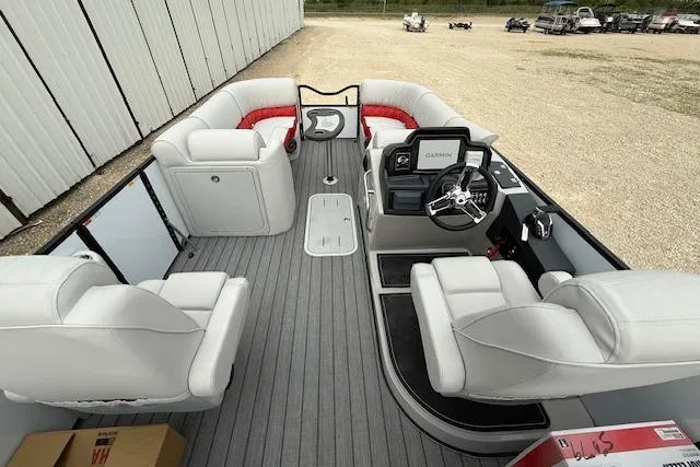 Slide: The Image of Luxurious 2025 SunCatcher ELITE 324RC pontoon boat with spacious seating and modern helm. - 6