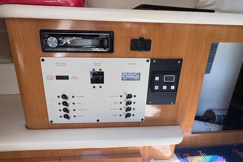 Slide: The Image of Control panel of a 2001 Bayliner 2655 Ciera boat with audio system. - 11