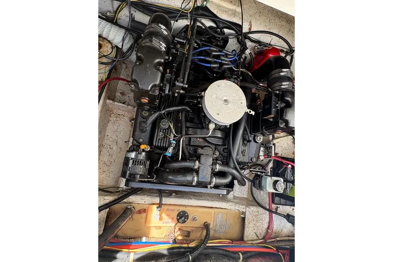Slide: The Image of Engine compartment of a 2001 Bayliner 2655 Ciera boat, showing detailed wiring and components. - 16