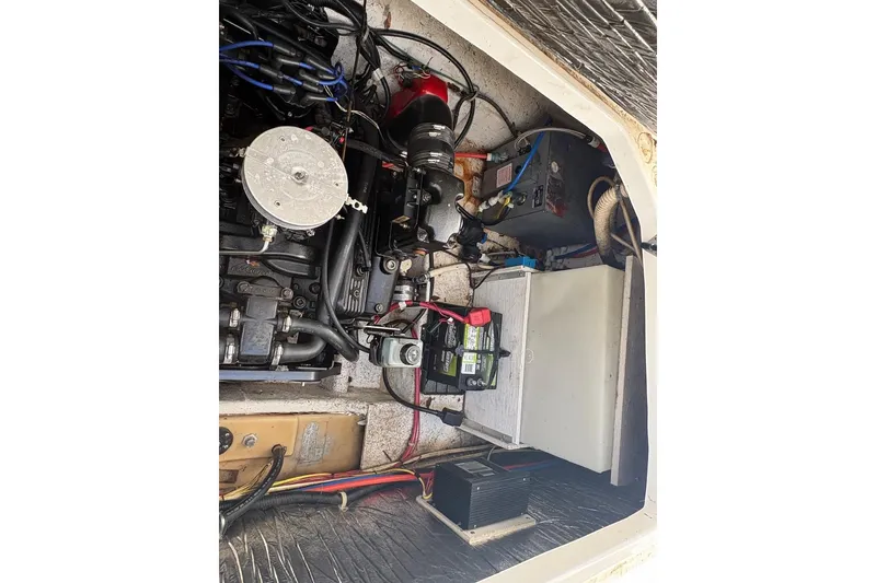 Slide: The Image of Engine compartment of a 2001 Bayliner 2655 Ciera boat, showing mechanical components. - 17