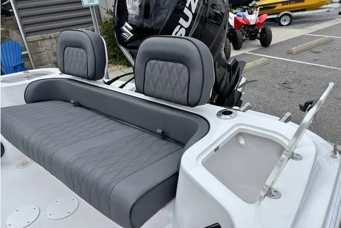 Slide: The Image of Modern ALK2 23CRX boat interior with gray seating and storage, 2026 model. - 12