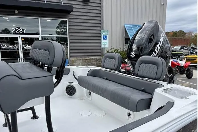 Slide: The Image of 2026 ALK2 23CRX boat with Suzuki engine, featuring gray seating and modern design. - 9