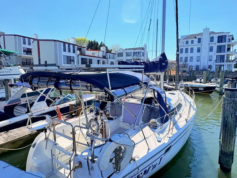 Slide: The Image of 2001 Catalina 36 Mark II sailboat docked on a sunny day. - 1