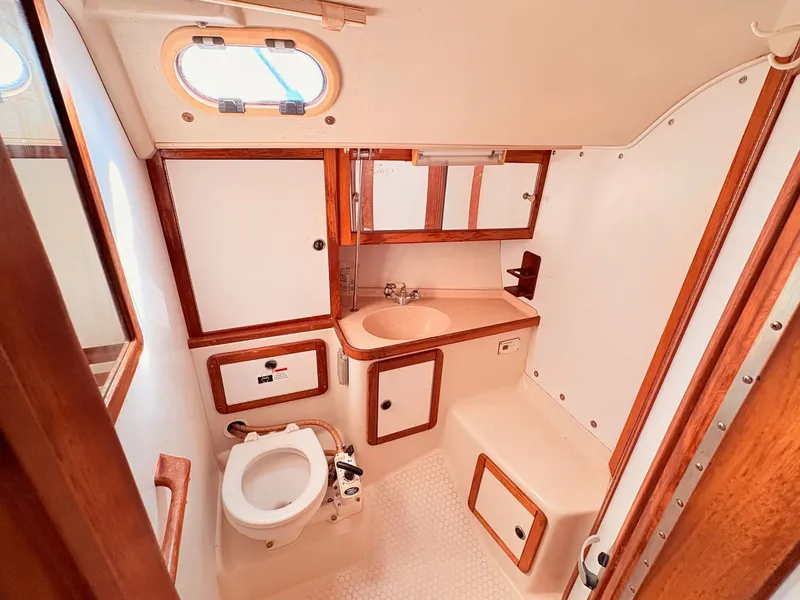 Slide: The Image of Interior view of a 2001 Catalina 36 Mark II yacht bathroom. - 15