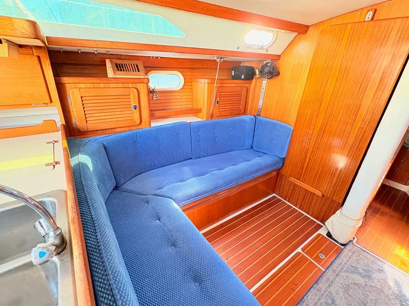 Slide: The Image of Interior of a 2001 Catalina 36 Mark II yacht with blue upholstery. - 19