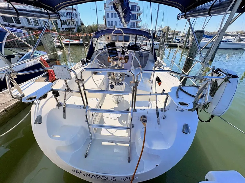 Slide: The Image of Rear view of a 2001 Catalina 36 Mark II in harbor. - 2