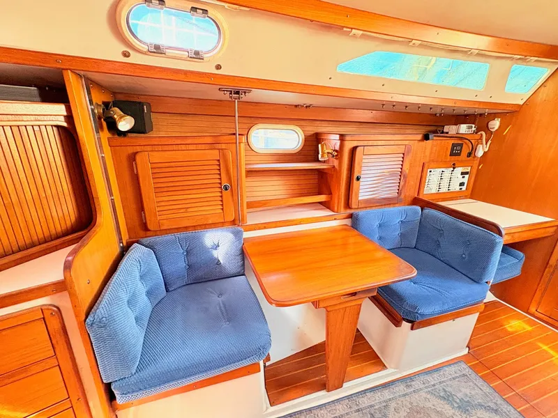 Slide: The Image of Interior of a 2001 Catalina 36 Mark II yacht with blue upholstery. - 20