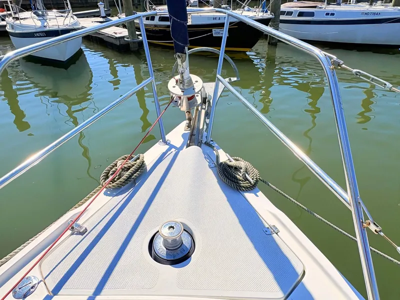 Slide: The Image of Bow of a 2001 Catalina 36 Mark II sailboat in harbor. - 6