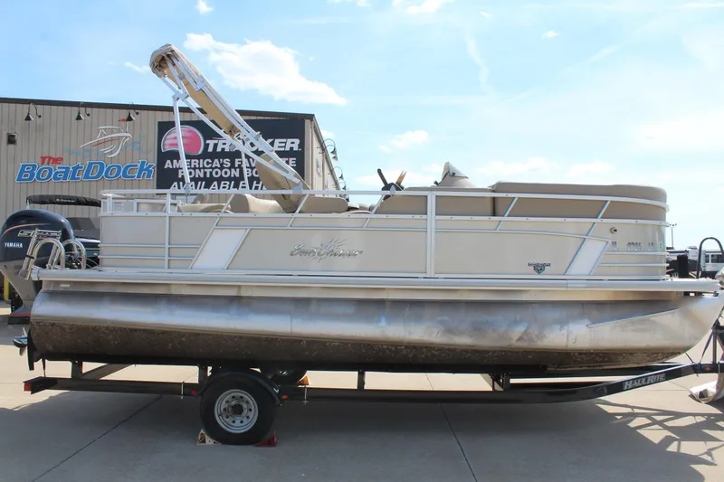 The Image of 2020 SunChaser Geneva Fish 20 4.0 pontoon boat on trailer at dealership. - 0
