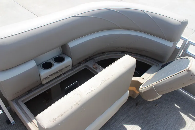 Slide: The Image of 2020 SunChaser Geneva Fish 20 4.0 boat seating with storage compartment and cup holders. - 13