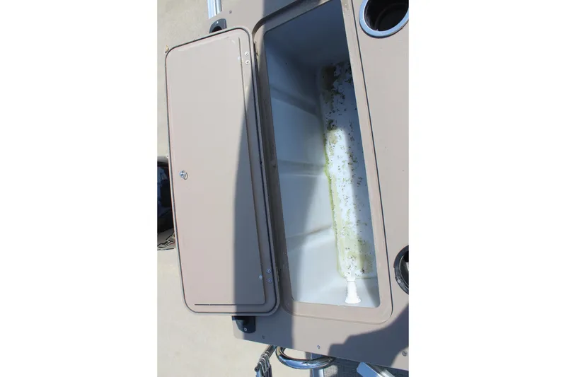 Slide: The Image of Open storage compartment on 2020 SunChaser Geneva Fish 20 4.0 boat. - 24
