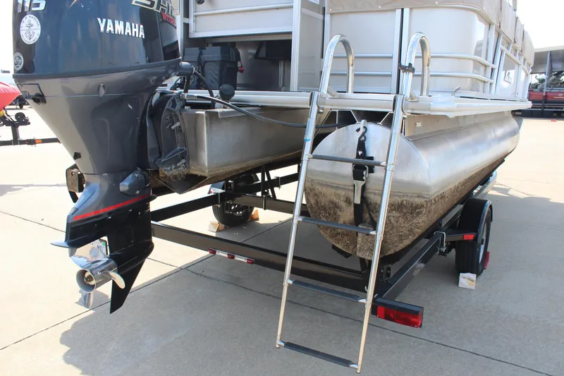Slide: The Image of 2020 SunChaser Geneva Fish 20 4.0 pontoon boat with Yamaha outboard motor and trailer. - 26