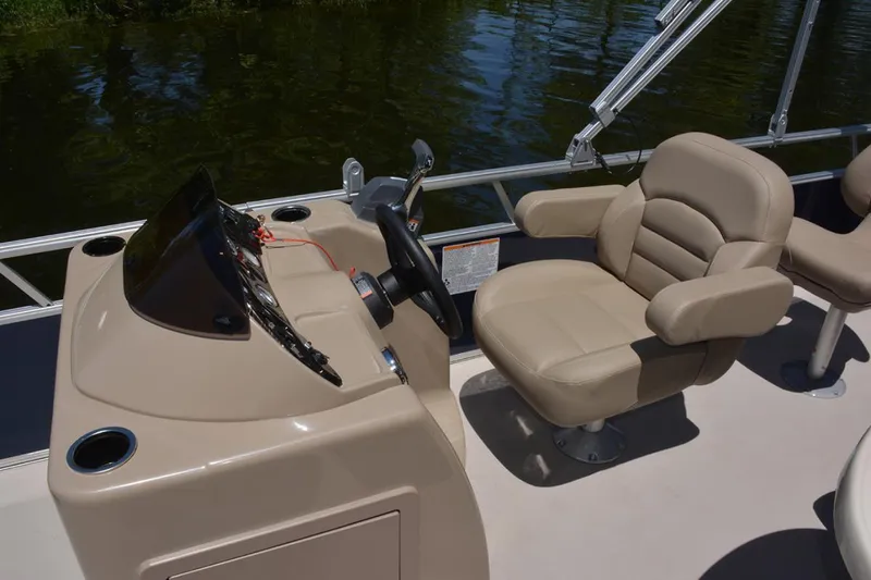 Slide: The Image of Manufacturer Provided Image: 2020 SunChaser Geneva Fish 20 4.0 boat interior with captain's chair and steering console. - 37