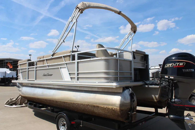 Slide: The Image of 2020 SunChaser Geneva Fish 20 4.0 pontoon boat with Yamaha engine on trailer. - 6