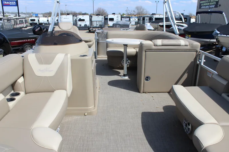 Slide: The Image of Interior of a 2020 SunChaser Geneva Fish 20 4.0 pontoon boat with beige seating. - 9