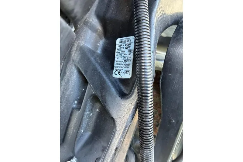 Slide: The Image of Label on a 1989 Grady-White Offshore 242 boat, showing engine specifications and serial number. - 4