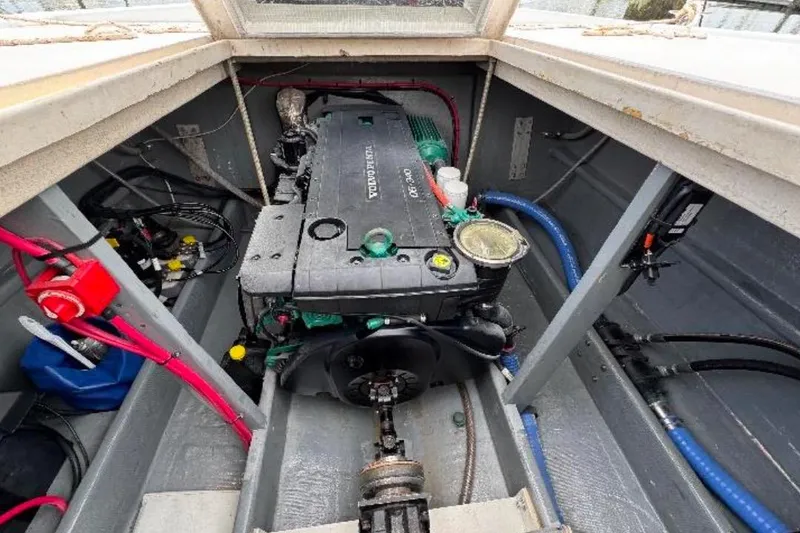 Slide: The Image of Engine compartment of a 1996 Premium 28 Parasail boat with Volvo Penta engine. - 11