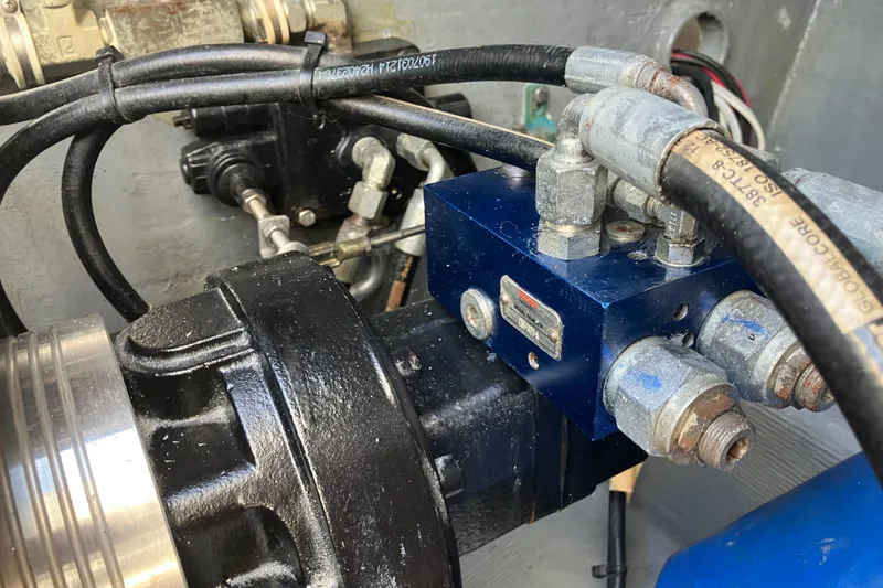 Slide: The Image of Close-up of mechanical components in a 1996 Premium 28 Parasail boat engine. - 22