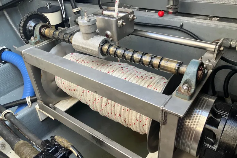 Slide: The Image of Close-up of a 1996 Premium 28 Parasail winch system with coiled rope. - 23