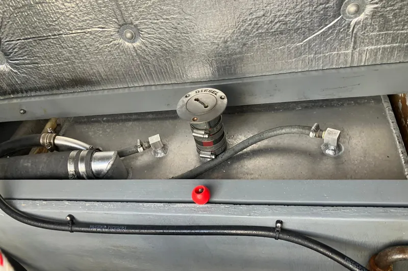 Slide: The Image of Diesel fuel tank compartment of a 1996 Premium 28 Parasail boat. - 27