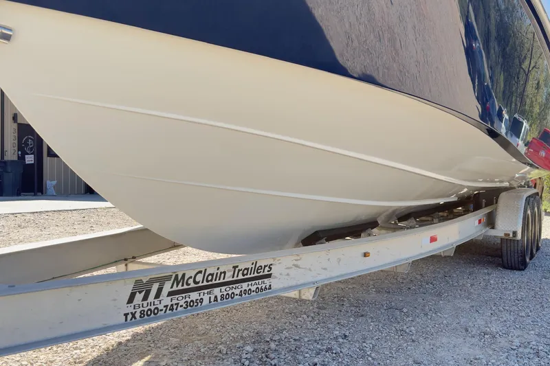 Slide: The Image of 2007 Everglades 350 Center Console boat on McClain trailer, side view. - 3
