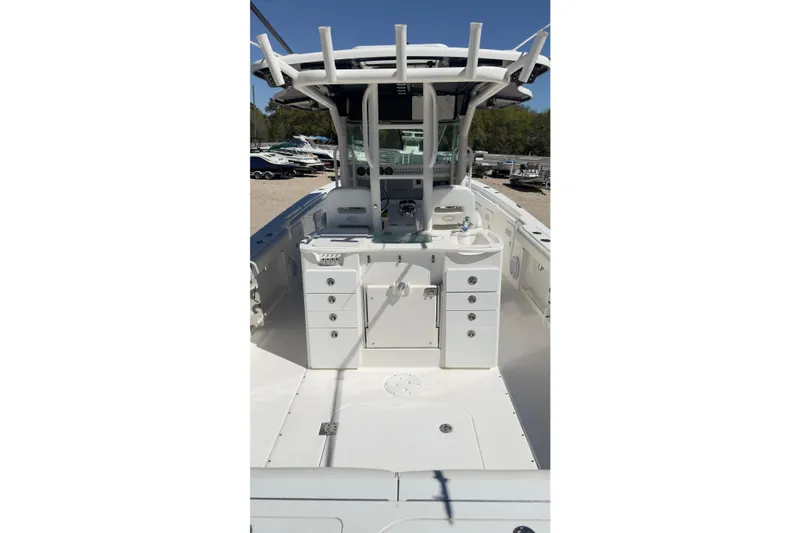 Slide: The Image of 2007 Everglades 350 Center Console boat interior with helm and storage compartments. - 8